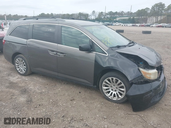 2011 Honda Odyssey EX with VIN 5FNRL5H49BB082706, listed as a IAAI auction lot 42080414 with 228,176 mi miles and . Bid and sale history available at carsss.com. Image 1.