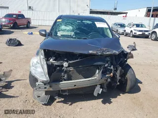 2017 Nissan Versa Sedan SV with VIN 3N1CN7AP1HL877990, listed as a IAAI auction lot 41829100 with 84,628 mi miles. Bid and sale history available at carsss.com. Image 12.