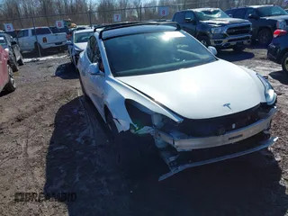 2020 Tesla Model 3 Long Range with VIN 5YJ3E1EB9LF735340, listed as a IAAI auction lot 41765919 with Not Provided miles. Bid and sale history available at carsss.com. Image 1.