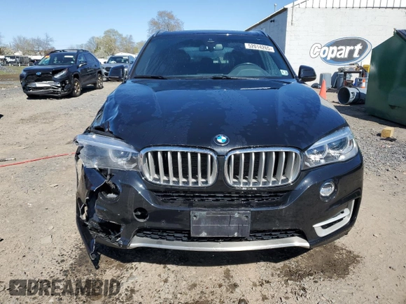 2018 BMW X5 xDrive35i with VIN 5UXKR0C5XJ0X97623, listed as a Copart auction lot 52014265 with 87,122 mi miles and Salvage Title. Bid and sale history available at carsss.com. Image 5.