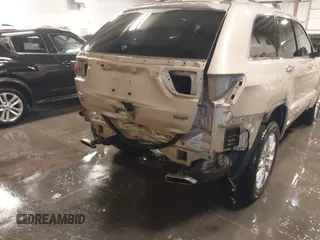 2015 Jeep Grand Cherokee Summit with VIN 1C4RJFJG5FC918837, listed as a IAAI auction lot 41126436 with 155,516 mi miles. Bid and sale history available at carsss.com. Image 6.