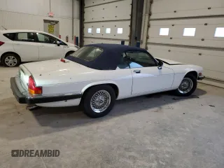 1989 Jaguar XJS z VIN SAJNV4847KC164497, wystawiony jako Copart lot #87258504 z przebiegiem 90 299 mil mil oraz Szkody całkowita. Historia ofert i sprzedaży dostępna na DreamBid. Obrazek 3.