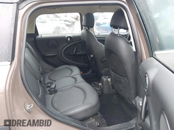 2014 MINI Countryman S with VIN WMWZC5C54EWM17898, listed as a IAAI auction lot 42343469 with 112,773 mi miles and . Bid and sale history available at DreamBid. Image 8.