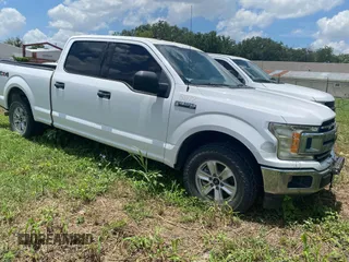 2018 Ford F-150 XL with VIN 1FTFW1E52JKE25972, listed as a IAAI auction lot 42698540 with 153,929 mi miles and . Bid and sale history available at DreamBid. Image 1.