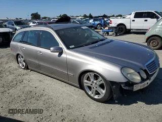 2006 Mercedes-Benz E 500 with VIN WDBUH83J96X194071, listed as a Copart auction lot 71035284 with 121,818 mi miles and Salvage Title. Bid and sale history available at carsss.com. Image 4.