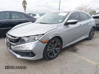 2019 Honda Civic Sport with VIN 2HGFC2F84KH576622, listed as a IAAI auction lot 41494019 with 87,495 mi miles and . Bid and sale history available at DreamBid. Image 2.
