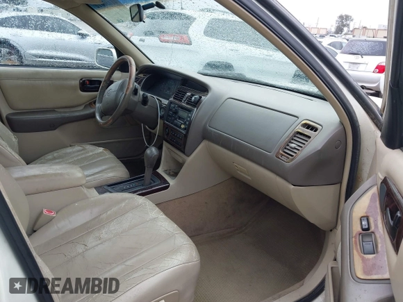 1998 Toyota Avalon XL with VIN 4T1BF18B7WU286333, listed as a IAAI auction lot 41736612 with 227,948 mi miles and . Bid and sale history available at DreamBid. Image 5.