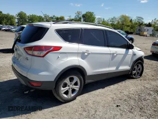 2013 Ford Escape SE z VIN 1FMCU9G99DUC73121, wystawiony jako Copart lot #57966605 z przebiegiem 169 764 mil mil oraz Szkoda całkowita • Salvage title. Historia ofert i sprzedaży dostępna na DreamBid. Obrazek 3.