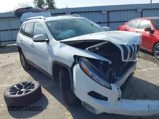 2015 Jeep Cherokee Latitude with VIN 1C4PJLCS4FW579221, listed as a IAAI auction lot 41463321 with 103,718 mi miles. Bid and sale history available at carsss.com. Image 1.