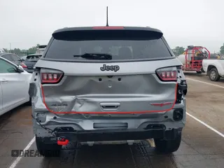 2019 Jeep Compass Trailhawk z VIN 3C4NJDDB9KT721767, wystawiony jako IAAI lot #42115252 z przebiegiem 78 607 mil mil oraz . Historia ofert i sprzedaży dostępna na DreamBid. Obrazek 17.