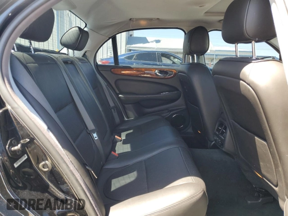 2009 Jaguar XJ 8 with VIN SAJWA71B79SH30431, listed as a Copart auction lot 52403185 with 67,143 mi miles and Salvage Title. Bid and sale history available at DreamBid. Image 10.