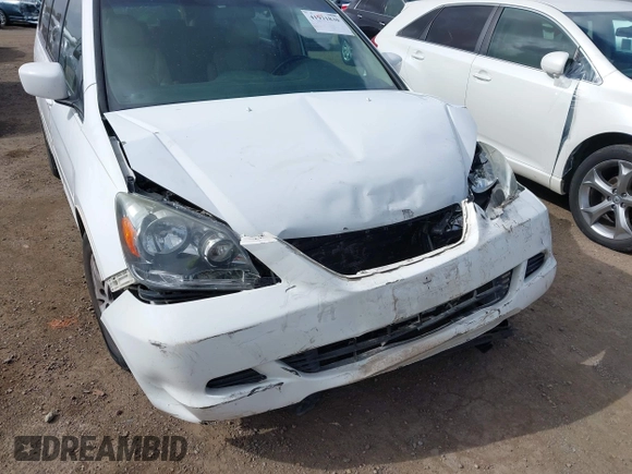 2006 Honda Odyssey EX-L z VIN 5FNRL38766B452806, wystawiony jako IAAI lot #41931830 z przebiegiem 133 822 mil mil oraz . Historia ofert i sprzedaży dostępna na DreamBid. Obrazek 6.