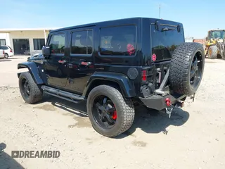 2014 Jeep Wrangler Unlimited Sahara with VIN 1C4BJWEG1EL258242, listed as a IAAI auction lot 41894966 with 90,234 mi miles. Bid and sale history available at carsss.com. Image 3.