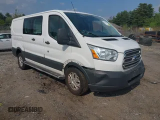 2015 Ford Transit Cargo z VIN 1FTNR1ZM5FKA65799, wystawiony jako IAAI lot #42473586 z przebiegiem 99 756 mil mil oraz . Historia ofert i sprzedaży dostępna na DreamBid. Obrazek 1.