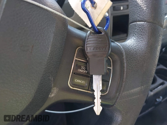 2012 Ram 1500 ST z VIN 3C6JD6DP5CG244057, wystawiony jako IAAI lot #42330312 z przebiegiem 237 024 mil mil oraz . Historia ofert i sprzedaży dostępna na DreamBid. Obrazek 11.