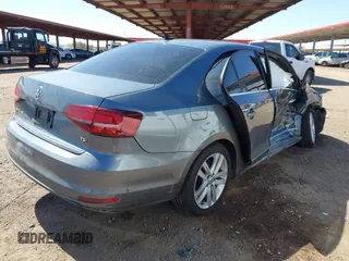 2017 Volkswagen Jetta SEL z VIN 3VWL17AJ6HM407708, wystawiony jako IAAI lot #41848360 z przebiegiem Nie podano mil oraz . Historia ofert i sprzedaży dostępna na DreamBid. Obrazek 4.