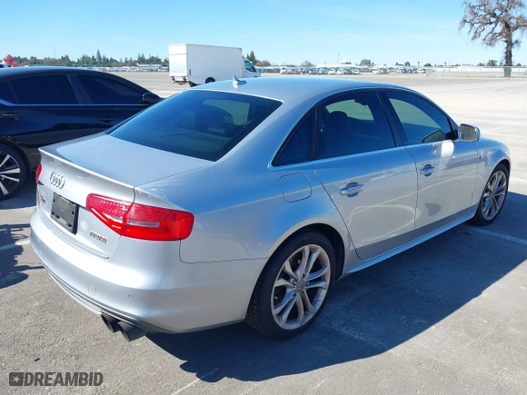 2015 Audi S4 Premium Plus with VIN WAUBGAFL2FA120068, listed as a IAAI auction lot 39620158 with 122,494 mi miles. Bid and sale history available at carsss.com. Image 4.