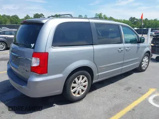 2014 Chrysler Town & Country Touring with VIN 2C4RC1BG7ER271455, listed as a IAAI auction lot 42102571 with 140,578 mi miles. Bid and sale history available at carsss.com. Image 4.