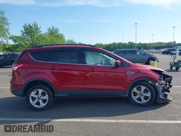 2014 Ford Escape SE z VIN 1FMCU0GX2EUB91517, wystawiony jako IAAI lot #42231093 z przebiegiem 67 436 mil mil oraz . Historia ofert i sprzedaży dostępna na DreamBid. Obrazek 14.