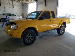 2004 Nissan Frontier XE Desert Runner with VIN 1N6ED26YX4C473134, listed as a Copart auction lot 45632025 with 178,397 mi miles and Salvage title. Bid and sale history available at DreamBid. Image 1.
