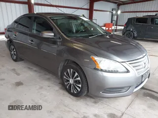 2015 Nissan Sentra S with VIN 3N1AB7AP9FY256920, listed as a IAAI auction lot 41491292 with 163,404 mi miles and . Bid and sale history available at DreamBid. Image 1.