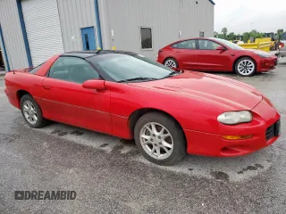 2002 Chevrolet Camaro z VIN 2G1FP22K322135404, wystawiony jako Copart lot #58767305 z przebiegiem Nie podano mil oraz Czysty tytuł • Clean title. Historia ofert i sprzedaży dostępna na DreamBid. Obrazek 4.
