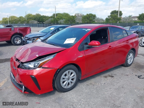2021 Toyota Prius L Eco with VIN JTDKAMFU6M3148195, listed as a IAAI auction lot 41801369 with 130,601 mi miles. Bid and sale history available at carsss.com. Image 18.