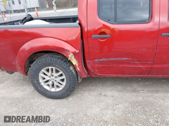 2015 Nissan Frontier SV with VIN 1N6AD0EV7FN733510, listed as a IAAI auction lot 41716269 with 197,125 mi miles and . Bid and sale history available at DreamBid. Image 14.