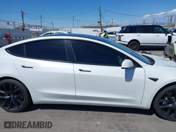 2019 Tesla Model 3 Mid Range with VIN 5YJ3E1EA5KF327181, listed as a IAAI auction lot 41860943 with 157,335 mi miles and . Bid and sale history available at DreamBid. Image 13.