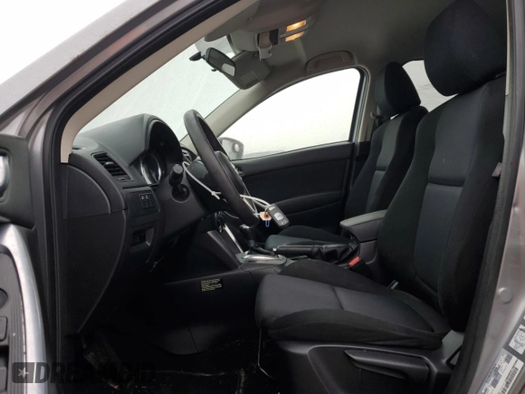 2015 Mazda CX-5 Sport with VIN JM3KE4BEXF0499688, listed as a Copart auction lot 88988095 with 258,460 mi miles and Salvage title. Bid and sale history available at DreamBid. Image 7.