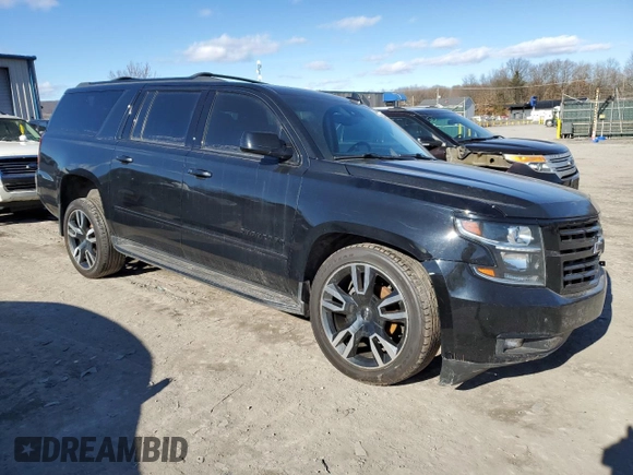 2019 Chevrolet Suburban Premier with VIN 1GNSKJKC7KR146871, listed as a Copart auction lot 43017234 with 96,965 mi miles and Salvage Title. Bid and sale history available at DreamBid. Image 4.