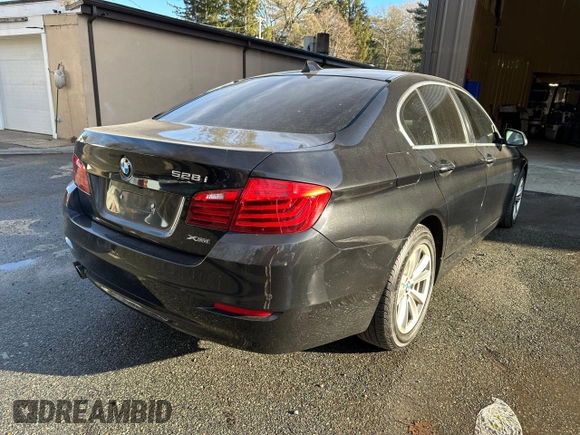 2016 BMW 5 Series 528i xDrive with VIN WBA5A7C53GG152050, listed as a Copart auction lot 53934595 with 104,678 mi miles and Clean Title. Bid and sale history available at carsss.com. Image 4.
