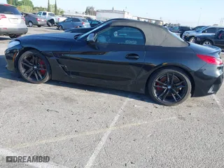2022 BMW Z4 sDriveM40i with VIN WBAHF9C08NWX88691, listed as a IAAI auction lot 42012469 with 11,108 mi miles. Bid and sale history available at carsss.com. Image 14.