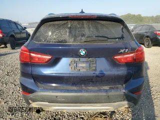 2017 BMW X1 sDrive28i with VIN WBXHU7C39H5H35490, listed as a Copart auction lot 75499974 with 0 mi miles and Salvage Title. Bid and sale history available at carsss.com. Image 6.