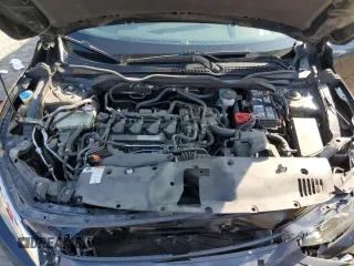2018 Honda Civic EX-T z VIN JHMFC1F38JX018777, wystawiony jako Copart lot #43087715 z przebiegiem 143 847 mil mil oraz Szkoda całkowita • Salvage title. Historia ofert i sprzedaży dostępna na DreamBid. Obrazek 11.