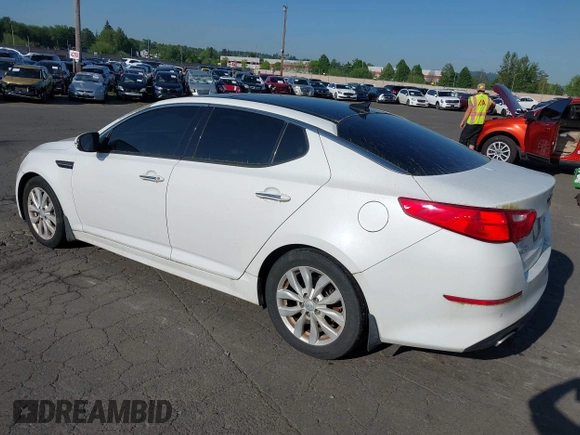 2014 Kia Optima EX with VIN 5XXGN4A73EG314797, listed as a IAAI auction lot 42136952 with 71,310 mi miles and . Bid and sale history available at carsss.com. Image 3.