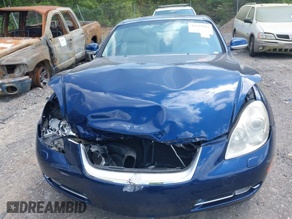 2006 Lexus SC 430 z VIN JTHFN48Y669006546, wystawiony jako IAAI lot #42119904 z przebiegiem 93 250 mil mil oraz . Historia ofert i sprzedaży dostępna na DreamBid. Obrazek 6.