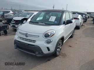 2014 FIAT 500L Trekking with VIN ZFBCFADH3EZ018080, listed as a IAAI auction lot 41680553 with 131,080 mi miles and . Bid and sale history available at DreamBid. Image 2.