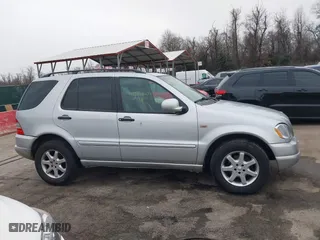 1999 Mercedes-Benz M-Class with VIN 4JGAB72E4XA113675, listed as a IAAI auction lot 41554604 with 230,092 mi miles. Bid and sale history available at carsss.com. Image 13.