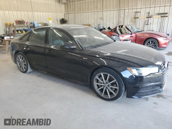 2016 Audi A6 Prestige with VIN WAUHGAFC2GN001442, listed as a Copart auction lot 61633805 with 128,140 mi miles and Salvage title. Bid and sale history available at DreamBid. Image 4.