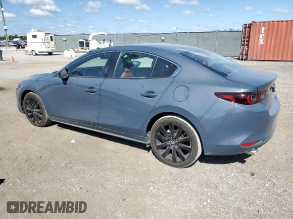 2025 Mazda 3 S Carbon Edition with VIN 3MZBPBCM4SM454067, listed as a Copart auction lot 43981255 with 2,396 mi miles and Clean Title. Bid and sale history available at DreamBid. Image 2.
