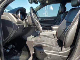 2016 Jeep Grand Cherokee Limited 75th Anniversary with VIN 1C4RJFBG7GC411146, listed as a Copart auction lot 53328675 with 110,439 mi miles and Salvage Title. Bid and sale history available at DreamBid. Image 7.
