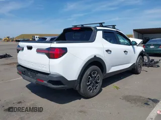 2022 Hyundai Santa Cruz SEL z VIN 5NTJC4AE4NH036346, wystawiony jako IAAI lot #42154082 z przebiegiem 37 402 mil mil oraz . Historia ofert i sprzedaży dostępna na DreamBid. Obrazek 4.