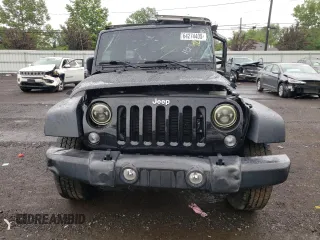 2017 Jeep Wrangler Unlimited Sport with VIN 1C4BJWDG7HL747010, listed as a Copart auction lot 64274405 with 61,602 mi miles and Salvage title. Bid and sale history available at DreamBid. Image 5.