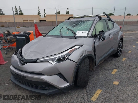2019 Toyota C-HR XLE with VIN JTNKHMBX8K1046347, listed as a IAAI auction lot 41778368 with 49,918 mi miles and . Bid and sale history available at DreamBid. Image 2.