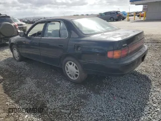 1994 Toyota Camry XLE with VIN JT2GK13E0R0012242, listed as a Copart auction lot 50966775 with 70,922 mi miles and Salvage Title. Bid and sale history available at carsss.com. Image 2.