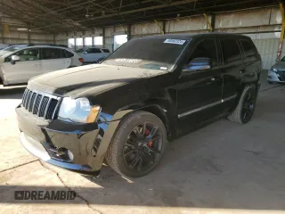 2008 Jeep Grand Cherokee SRT-8 with VIN 1J8HR78358C160930, listed as a Copart auction lot 80562324 with 137,147 mi miles and Salvage Title. Bid and sale history available at carsss.com. Image 1.