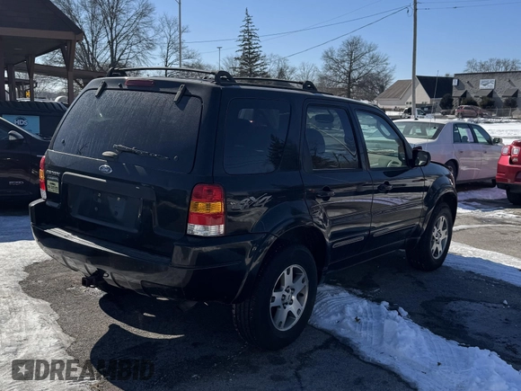 2004 Ford Escape Limited with VIN 1FMCU94144KA88842, listed as a IAAI auction lot 41643194 with 148,082 mi miles. Bid and sale history available at carsss.com. Image 4.