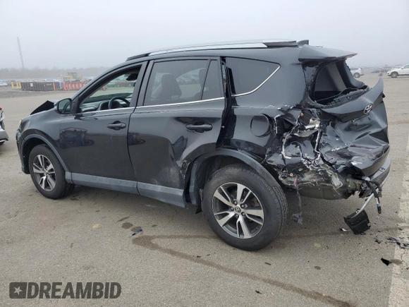 2018 Toyota RAV4 XLE with VIN 2T3RFREV8JW715099, listed as a Copart auction lot 51313485 with 140,107 mi miles and Salvage Title. Bid and sale history available at DreamBid. Image 2.