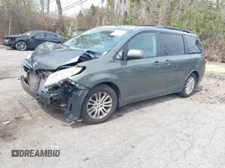 2012 Toyota Sienna XLE AAS with VIN 5TDYK3DC1CS199113, listed as a IAAI auction lot 42123757 with 211,723 mi miles and . Bid and sale history available at carsss.com. Image 2.